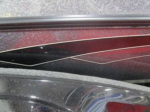 2025 Ranger Z521 boat with sleek, glittery black and red detailing.