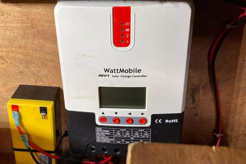 Latte Yacht Photos Pics MPPT solar charge controller in 1987 Nauticat 38 boat, with wiring and display.