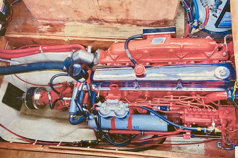 Latte Yacht Photos Pics Engine compartment of a 1987 Nauticat 38 sailboat, showcasing detailed mechanical components.