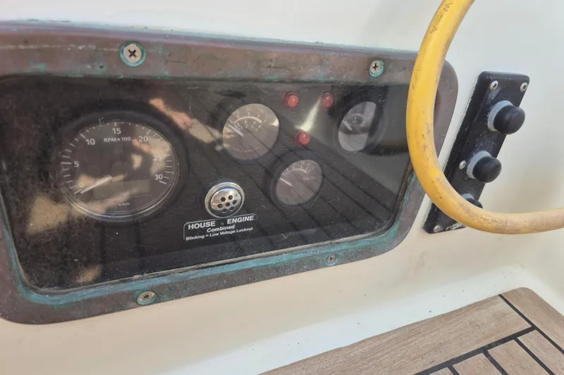 Pearl Yacht Photos Pics Control panel of a 1996 Cape George 36 sailboat with gauges and switches.