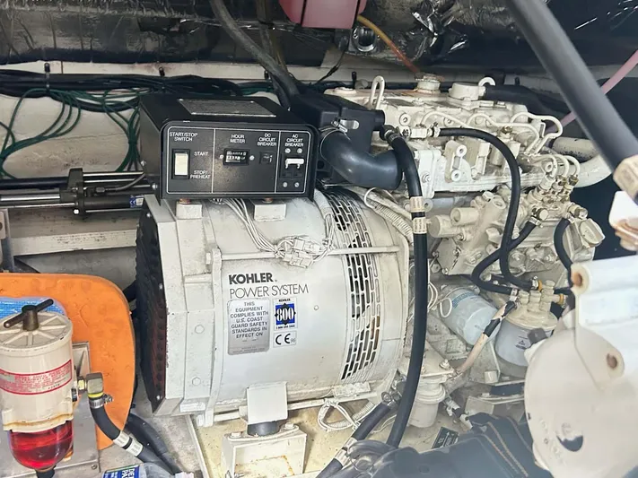 Intrepid Yacht Photos Pics Engine room of 1997 Cruisers Yachts 4270 Esprit with Kohler power system.
