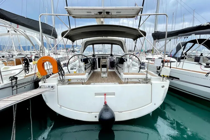  Yacht Photos Pics 2017 Beneteau Oceanis 41.1 yacht docked in marina, rear view.