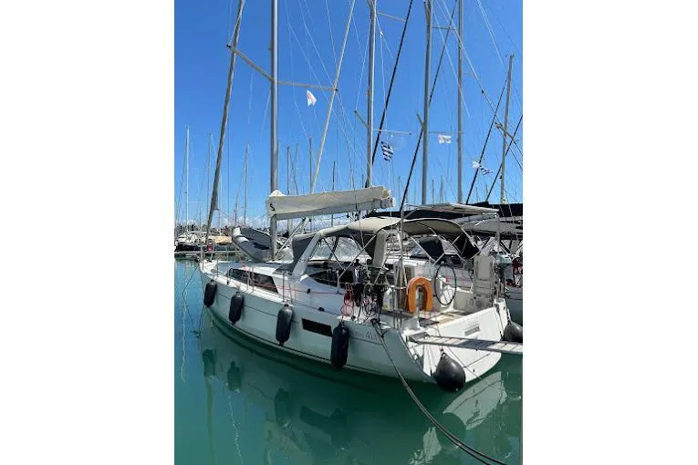  Yacht Photos Pics 2017 Beneteau Oceanis 41.1 sailboat docked in marina, clear blue sky.