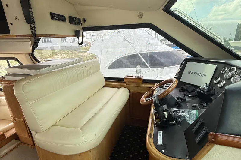 Must B Nice Yacht Photos Pics Interior of 2001 Custom Sports Catamaran 44 with Garmin navigation system and leather seating.