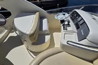 Cockpit of 2011 Azimut 55 EVOLUTION yacht with steering wheel and control panel.