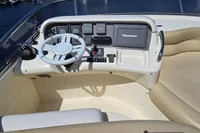 Cockpit of 2011 Azimut 55 EVOLUTION yacht with steering wheel and Raymarine navigation system.