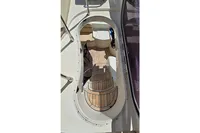 Staircase on 2011 Azimut 55 EVOLUTION yacht with wooden steps and sleek design.
