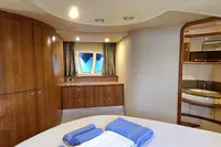 Luxurious interior of 2011 Azimut 55 EVOLUTION yacht with elegant wood finish.