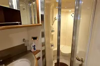Luxurious bathroom in 2011 Azimut 55 EVOLUTION yacht with shower and sink.