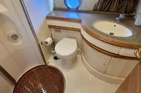 Luxurious bathroom in 2011 Azimut 55 EVOLUTION yacht with modern fixtures and elegant design.