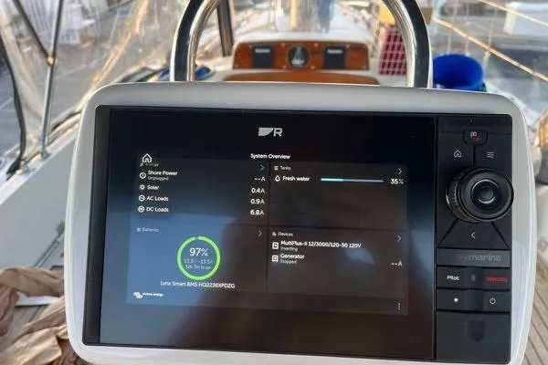 Pickle Yacht Photos Pics Touchscreen control panel on a 1989 Hylas 44 yacht displaying system overview.