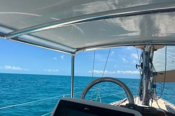 Pickle Yacht Photos Pics Sailing on a 1989 Hylas 44 yacht, clear blue ocean view.