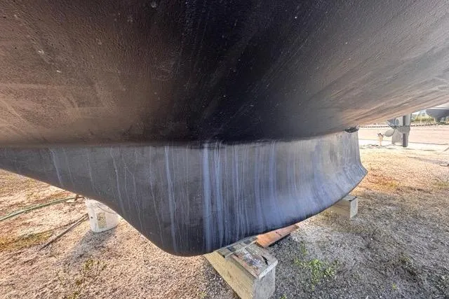 Pickle Yacht Photos Pics Bottom view of a 1989 Hylas 44 sailboat hull on dry dock.