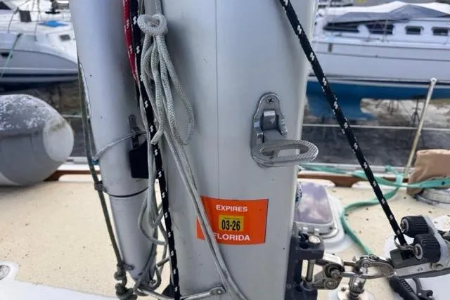 Pickle Yacht Photos Pics Sailboat deck with ropes and equipment, Hylas 44, 1989 model, docked in marina.