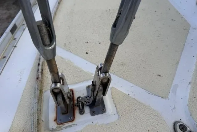 Pickle Yacht Photos Pics Close-up of rigging hardware on a 1989 Hylas 44 sailboat deck.