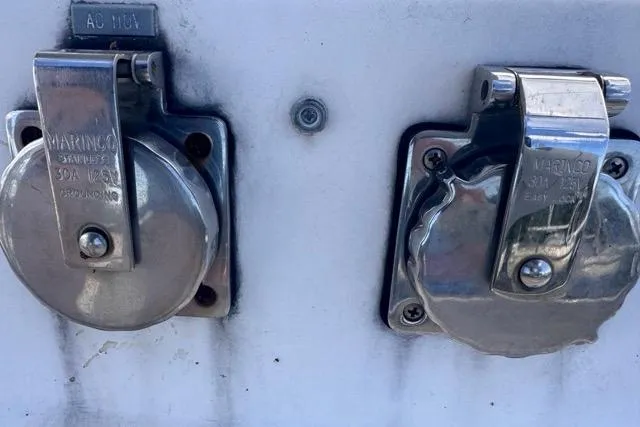 Pickle Yacht Photos Pics Two Marinco stainless steel power outlets on a 1989 Hylas 44 boat.