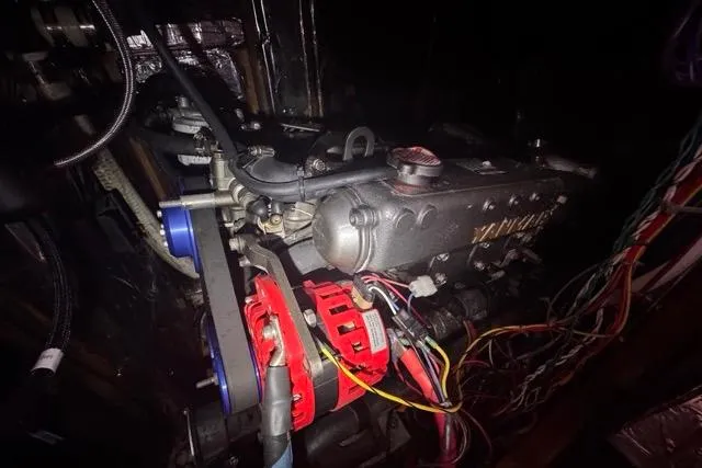 Pickle Yacht Photos Pics Engine of a 1989 Hylas 44 sailboat with visible wiring and components.