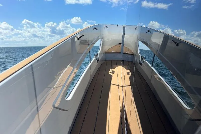 Michelle Yacht Photos Pics 2025 Azimut SeaDeck6 yacht deck with ocean view and clear skies.