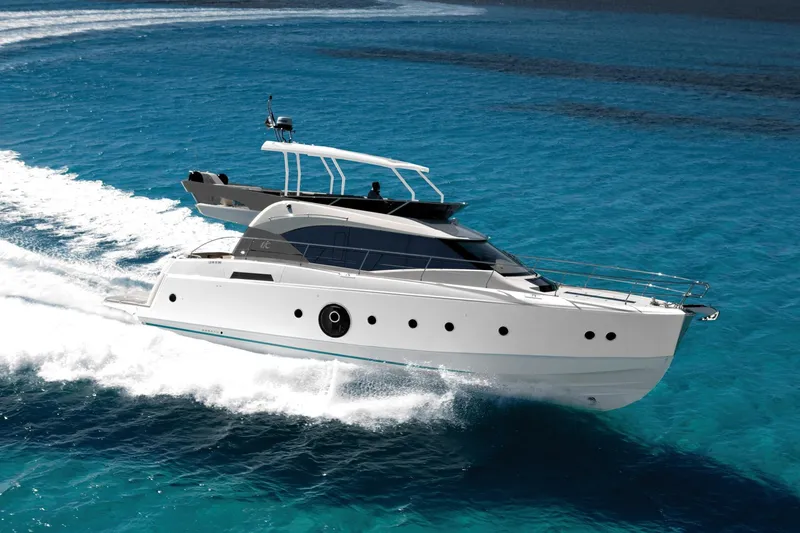 Soulshine Yacht Photos Pics 2017 Beneteau Monte Carlo MC6 yacht cruising on clear blue water.