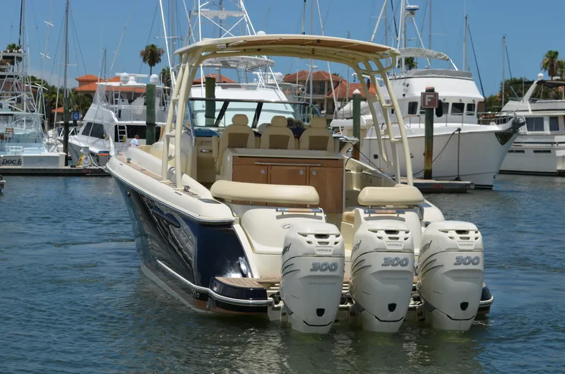  Yacht Photos Pics 2016 Chris-Craft Launch 36 boat with triple 300 horsepower engines docked in marina.