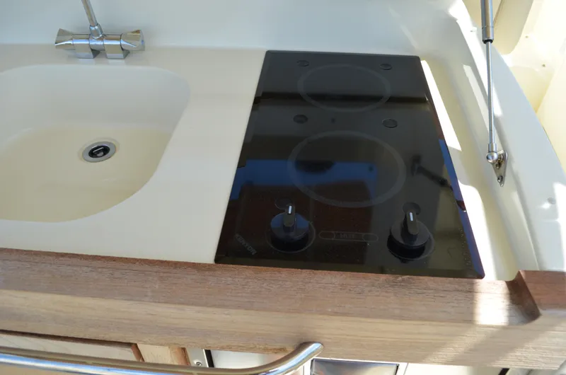  Yacht Photos Pics 2016 Chris-Craft Launch 36 boat kitchen with sink and stovetop.