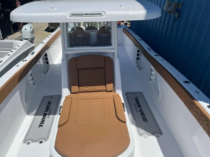  Yacht Photos Pics 2023 Twin Vee 340 GFX boat interior with tan seating and white deck.