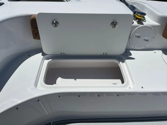  Yacht Photos Pics 2023 Twin Vee 340 GFX boat storage compartment with open lid.