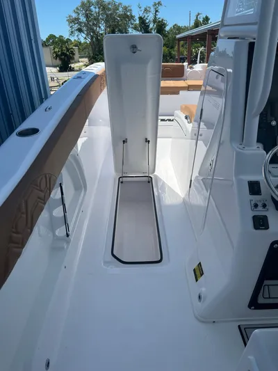  Yacht Photos Pics 2023 Twin Vee 340 GFX boat interior with open storage compartment.