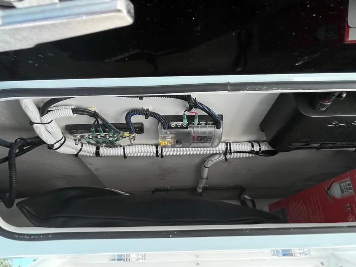  Yacht Photos Pics 2023 Twin Vee 340 GFX electrical compartment with wiring and components.