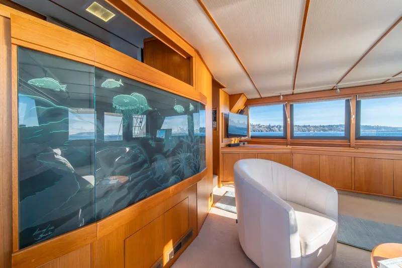 Sumo Yacht Photos Pics Luxurious interior of 1991 Tollycraft 57 Pilothouse Motor Yacht with scenic views.