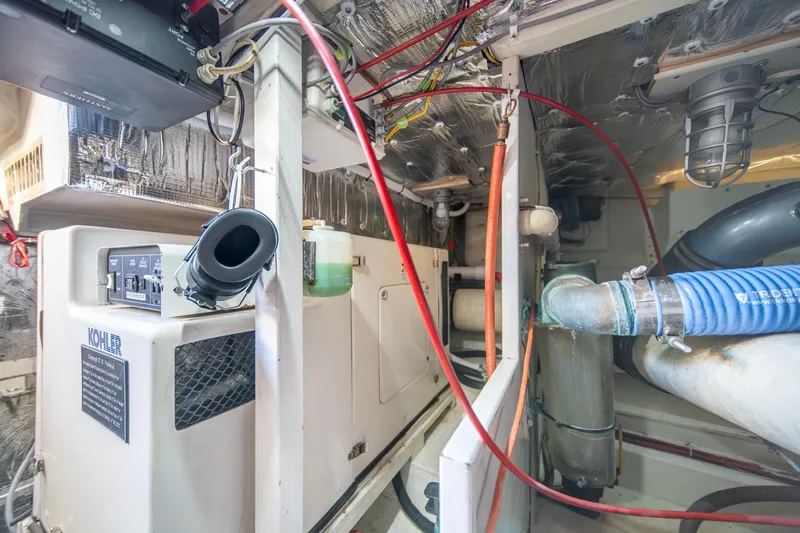 Sumo Yacht Photos Pics Engine room of 1991 Tollycraft 57 Pilothouse Motor Yacht with wiring and equipment.