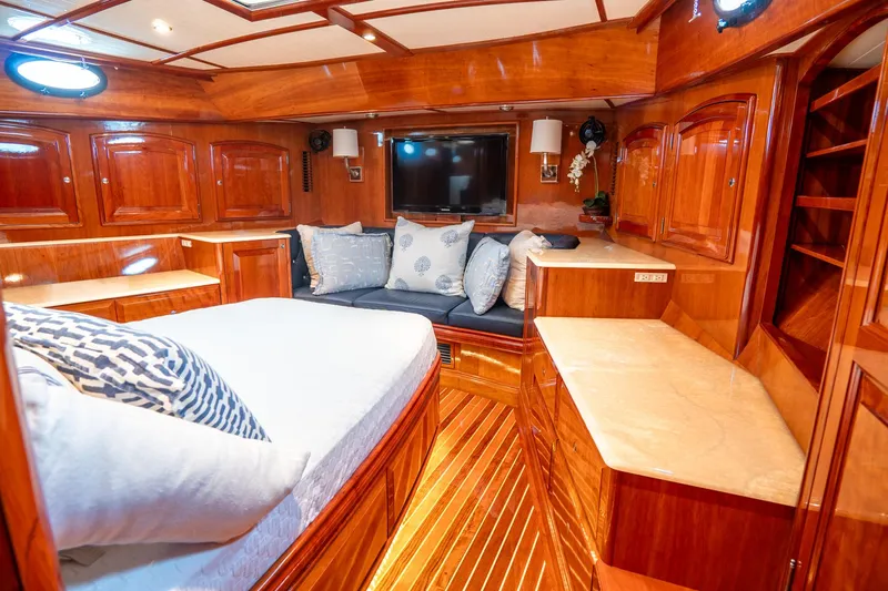 Sapphire II Yacht Photos Pics Luxurious 2006 Hinckley Talaria 55 FB yacht cabin with wood finish and cozy seating area.