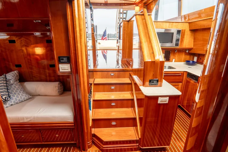 Sapphire II Yacht Photos Pics Luxurious 2006 Hinckley Talaria 55 FB yacht interior with wood finish and modern amenities.
