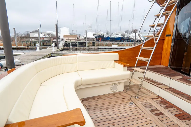 Sapphire II Yacht Photos Pics 2006 Hinckley Talaria 55 FB yacht with elegant seating and wooden deck.