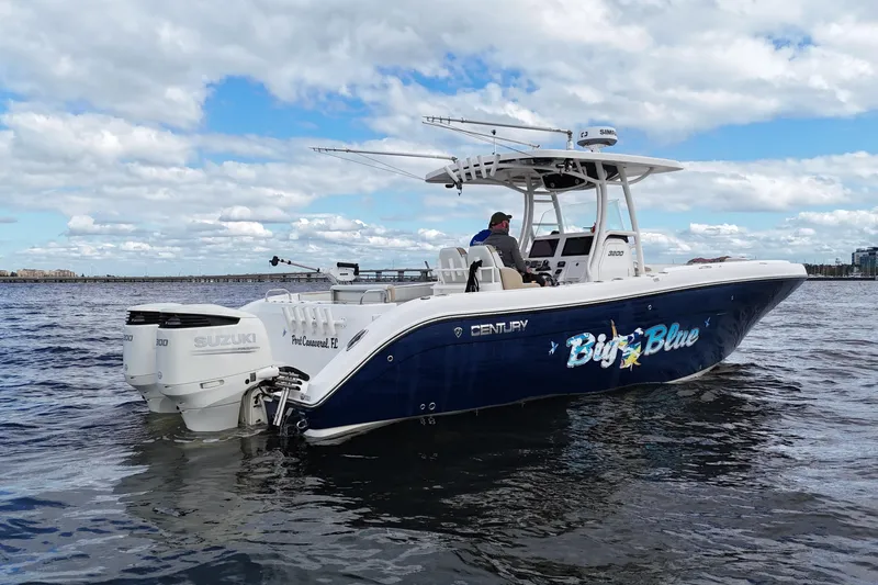 Big Blue Yacht Photos Pics 2017 Century 3200 Center Console boat on water, featuring dual Suzuki engines.