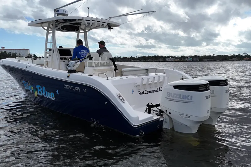 Big Blue Yacht Photos Pics 2017 Century 3200 Center Console boat with dual Suzuki engines on the water.