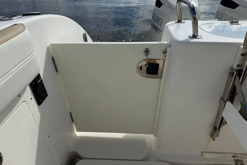 Big Blue Yacht Photos Pics 2017 Century 3200 Center Console boat with open side door and Suzuki engines.