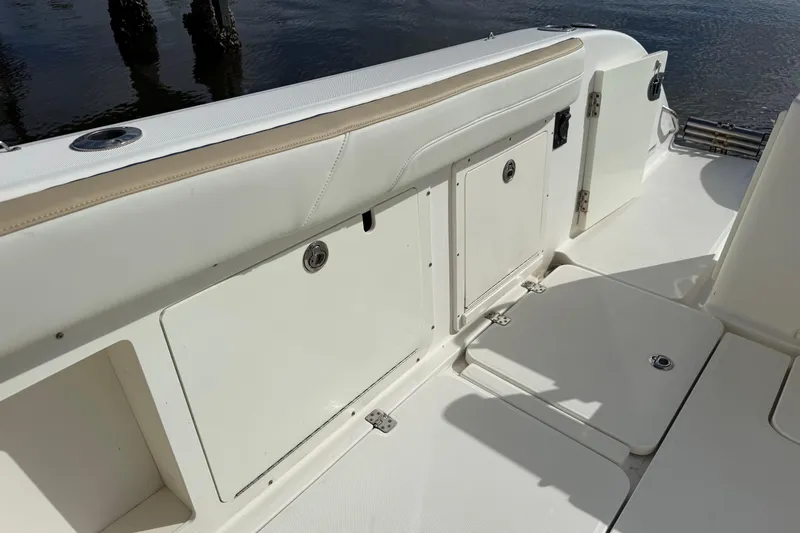 Big Blue Yacht Photos Pics 2017 Century 3200 Center Console boat interior with storage compartments and seating.