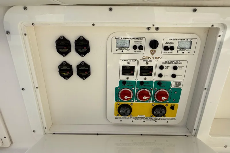 Big Blue Yacht Photos Pics Control panel of a 2017 Century 3200 Center Console boat, featuring engine and battery meters.