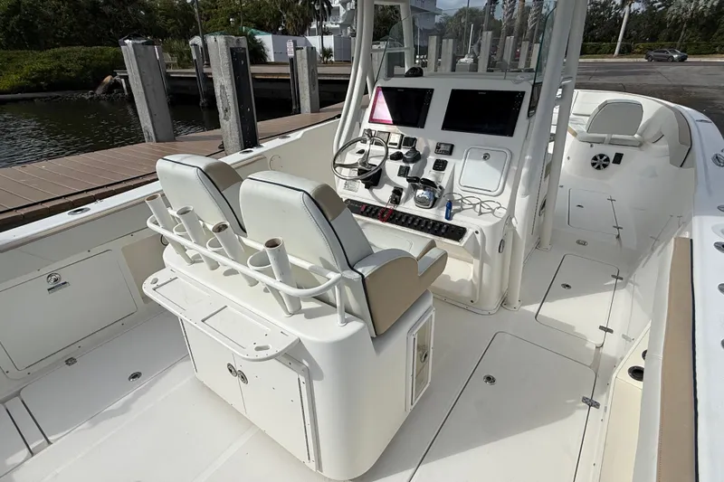 Big Blue Yacht Photos Pics 2017 Century 3200 Center Console boat interior with dual seats and control panel.