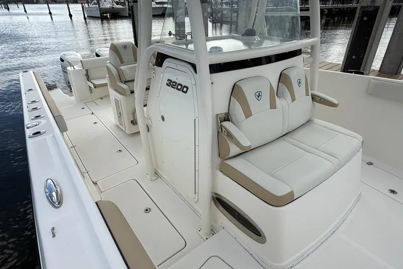 Big Blue Yacht Photos Pics 2017 Century 3200 Center Console boat interior with seating and console details.