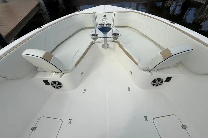 Big Blue Yacht Photos Pics 2017 Century 3200 Center Console boat interior with cushioned seating and cup holders.