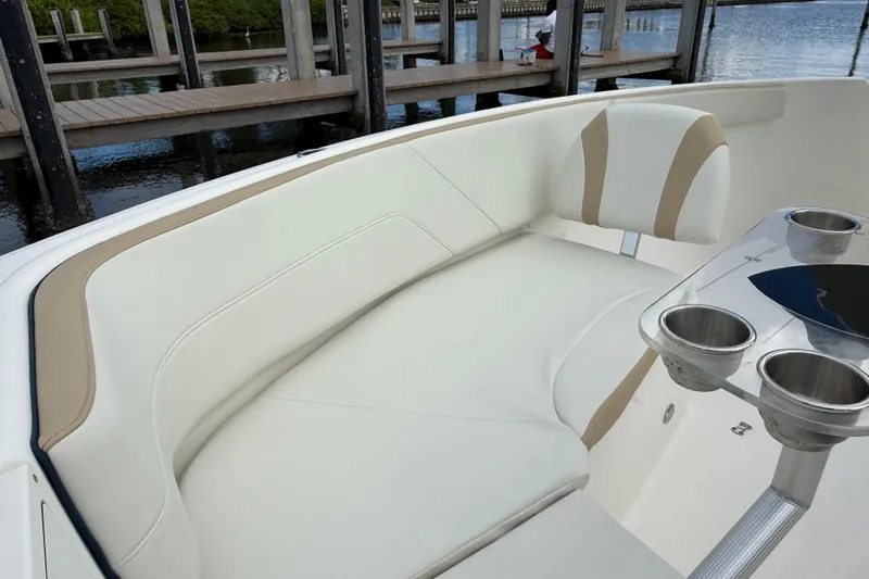 Big Blue Yacht Photos Pics 2017 Century 3200 Center Console boat interior with cushioned seating and cup holders.