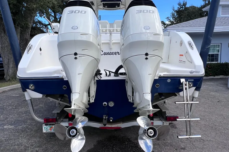 Big Blue Yacht Photos Pics 2017 Century 3200 Center Console boat with dual 300 horsepower engines, rear view.