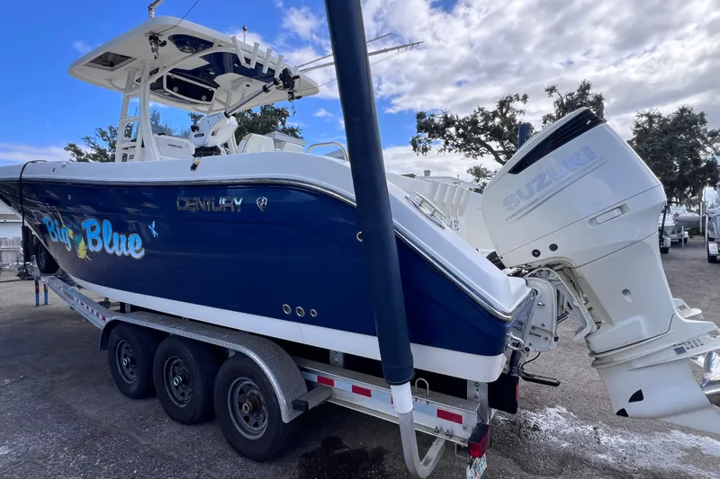 Big Blue Yacht Photos Pics 2017 Century 3200 Center Console boat with Suzuki engine on trailer, named "Big Blue."