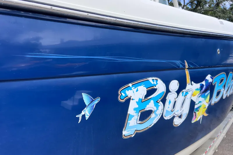 Big Blue Yacht Photos Pics Blue Century 3200 Center Console boat with "Big Blue" graphic and fish decal, 2017 model.