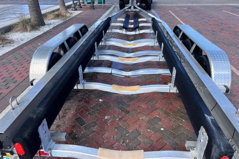 Big Blue Yacht Photos Pics Trailer for 2017 Century 3200 Center Console boat on brick pavement.