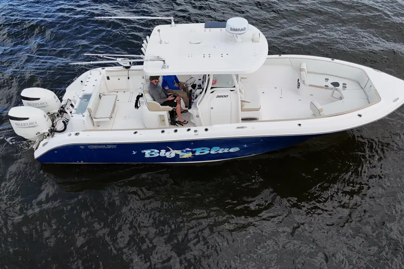 Big Blue Yacht Photos Pics 2017 Century 3200 Center Console boat on water, featuring "Big Blue" graphics and dual Suzuki engines.