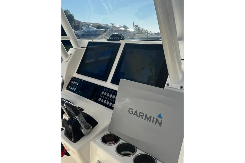  Yacht Photos Pics Edgewater 320CC 2015 boat dashboard with Garmin navigation system.