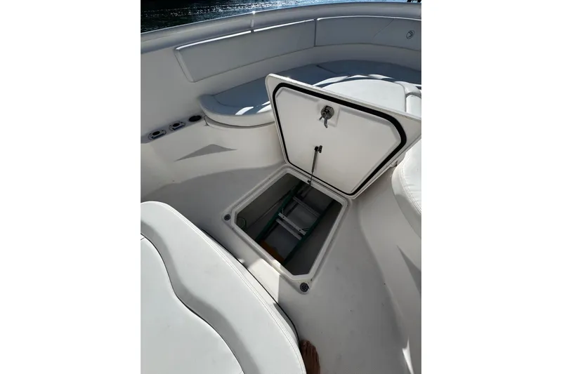  Yacht Photos Pics Open storage compartment on 2015 Edgewater 320CC boat deck.